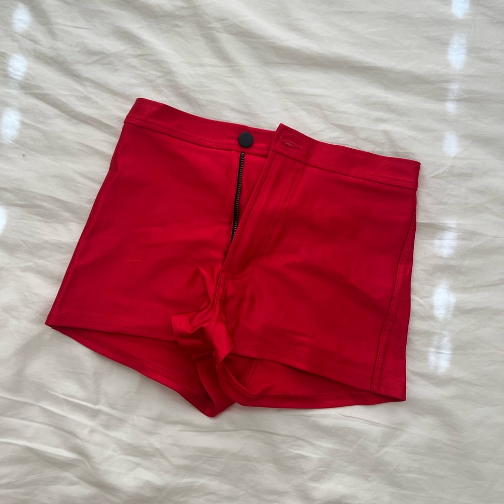 American apparel disco shorts in red- size small. Worn once.